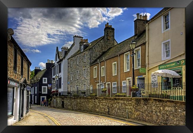 Along the Cobbled High Street Framed Print by Tom Gomez