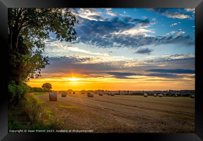 Hay Bale Sunset Framed Print by Dean French