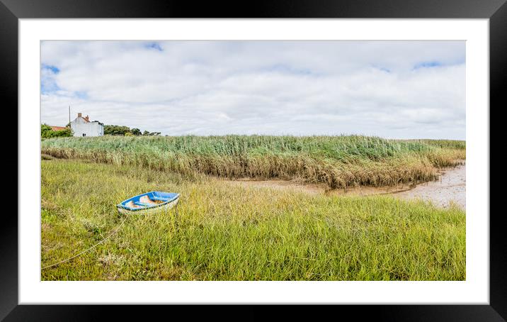 Lone boat at Brancaster Staithe Framed Mounted Print by Jason Wells