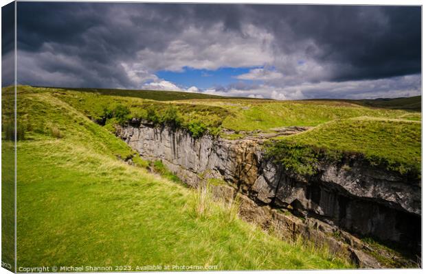 Hull Pot, Ribblesdale under a moody sky in the Yor Canvas Print by Michael Shannon