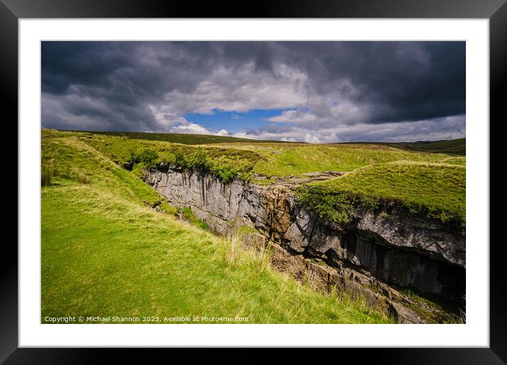 Hull Pot, Ribblesdale under a moody sky in the Yor Framed Mounted Print by Michael Shannon