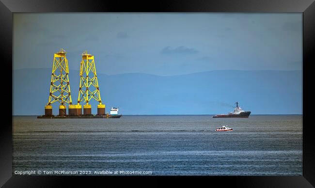 Offshore wind plant suction bucket jackets on Tow Framed Print by Tom McPherson