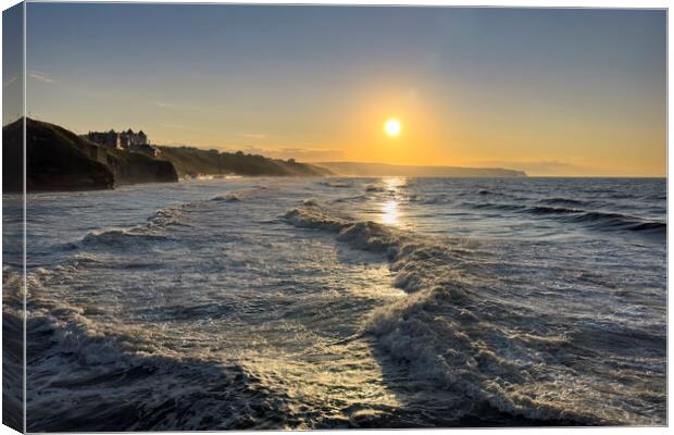 Whitby Beach Sunset Canvas Print by Derek Beattie