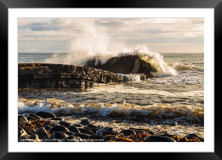 Dunstanburgh big splash at Greymare Rock Framed Mounted Print by Alan Dunnett