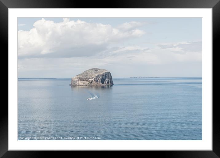 A small motor boat leaving Bass Rock, Firth of Forth, Scotland Framed Mounted Print by Dave Collins
