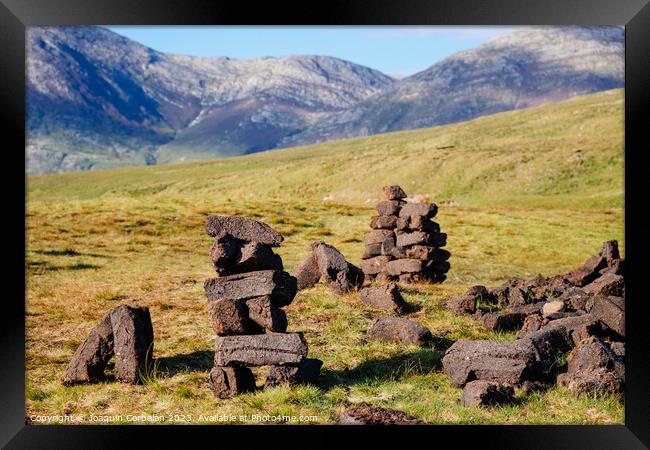 Peat blocks, in a traditional peat bog, on the coast of Ireland Framed Print by Joaquin Corbalan