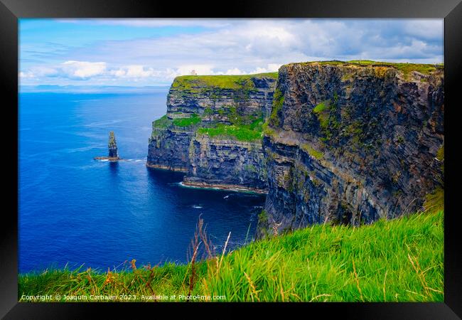 Beautiful view of the Cliffs of Moher, a calm blue sea with copy space. Framed Print by Joaquin Corbalan