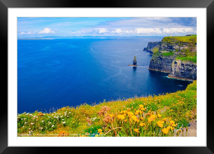 Beautiful view of the Cliffs of Moher, a calm blue sea with copy space. Framed Mounted Print by Joaquin Corbalan