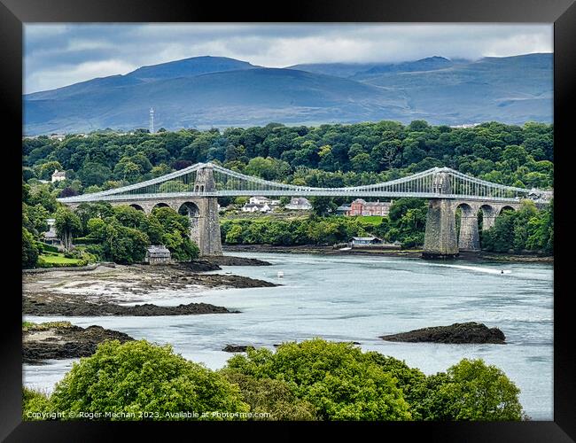 Crossing the Iconic Menai Bridge Anglesey Framed Print by Roger Mechan