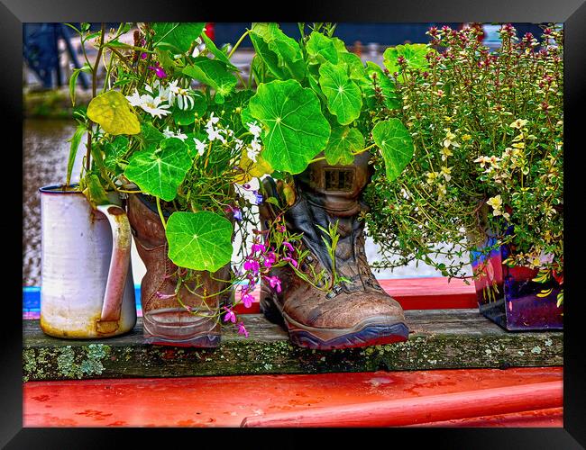 Trekking boots recycled as a cottage garden Framed Print by Steve Painter