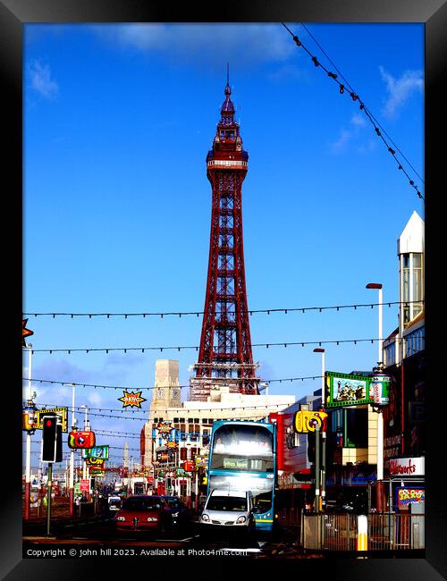Iconic Blackpool Tower Silhouette against Blue Sky Framed Print by john hill