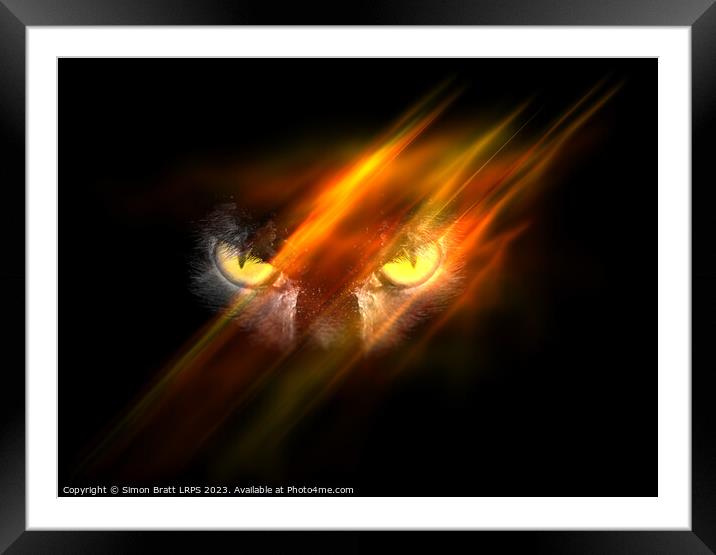 Evil animal eyes in the darkness with fire Framed Mounted Print by Simon Bratt LRPS