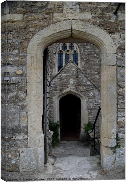 The entrance to the chapel at Farleigh Hungerford  Canvas Print by Peter Wiseman