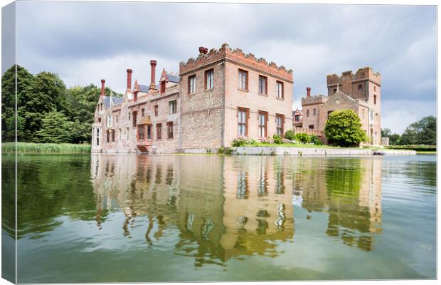 Oxburgh Hall reflecting in a moat Canvas Print by Jason Wells