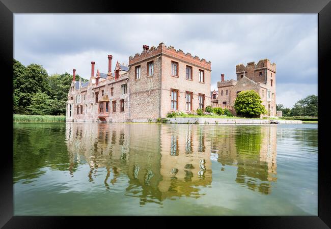 Oxburgh Hall reflecting in a moat Framed Print by Jason Wells
