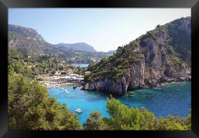 View of the amazing bay with beautiful crystal clear water and cliffs in Paleokastritsa, Corfu, Greece Framed Print by Virginija Vaidakaviciene