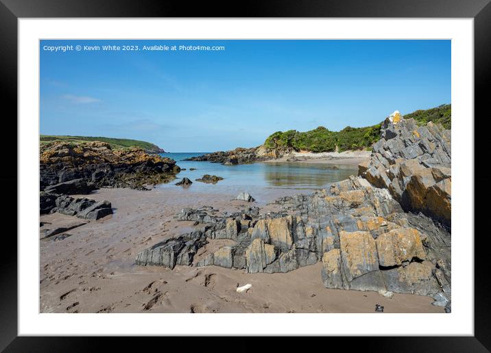 Dramatic rock formations on Angle Bay beach Framed Mounted Print by Kevin White