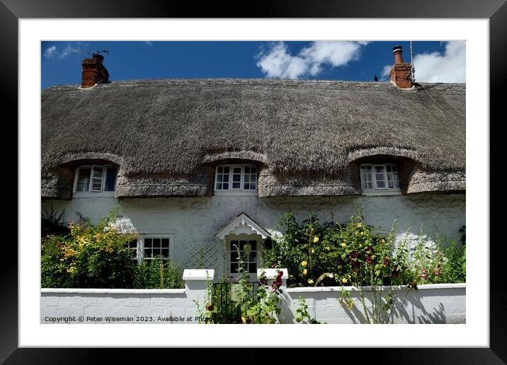  A thatched cottage  in Avebury Framed Mounted Print by Peter Wiseman
