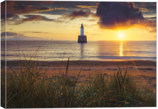 Dawn's Embrace at Rattray Lighthouse Canvas Print by Anthony McGeever