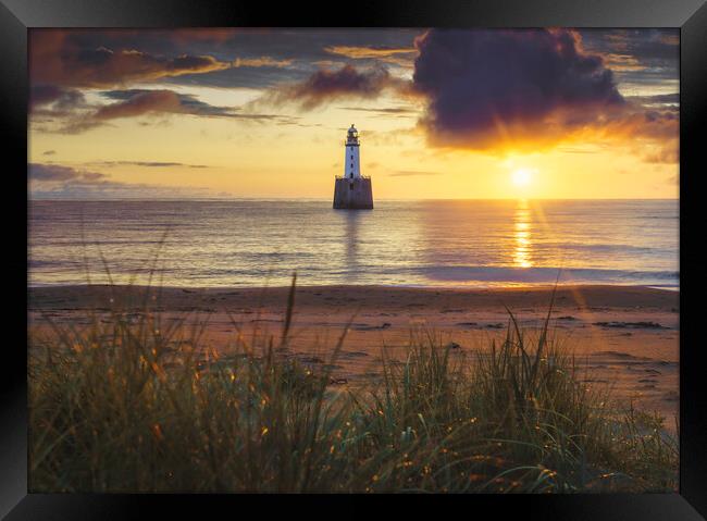 Dawn's Embrace at Rattray Lighthouse Framed Print by Anthony McGeever