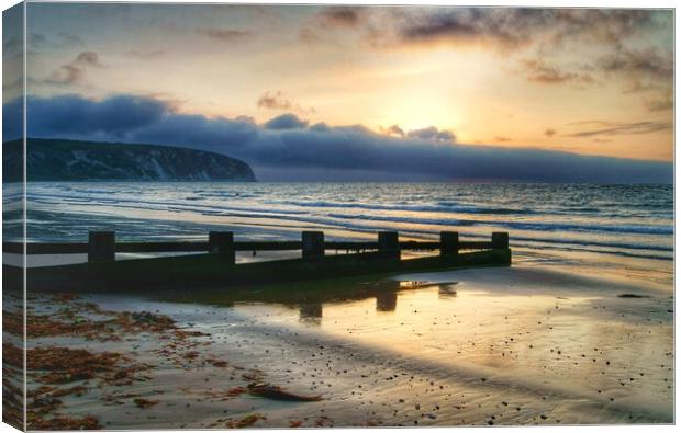 Sunrise over Swanage Bay, Dorset  Canvas Print by Darren Galpin