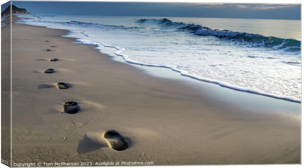 Footprints in the Sand Canvas Print by Tom McPherson