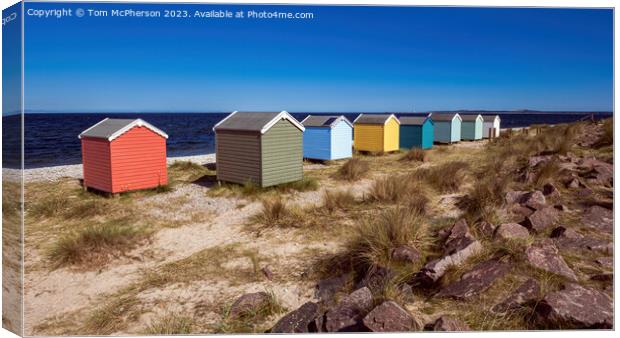 Multi-Coloured Huts on Findhorn Beach Canvas Print by Tom McPherson