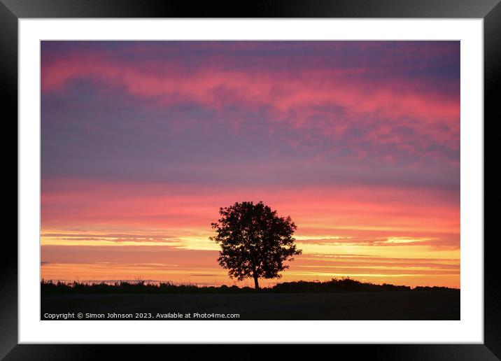 sunrise and tree silhouette Framed Mounted Print by Simon Johnson
