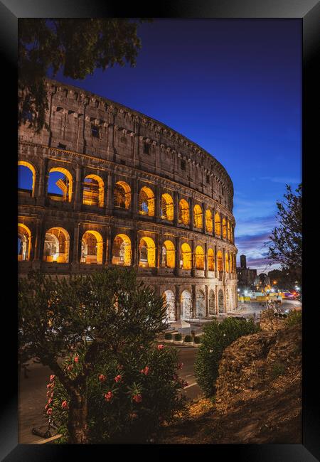 Nightfall At The Colosseum In Rome Framed Print by Artur Bogacki