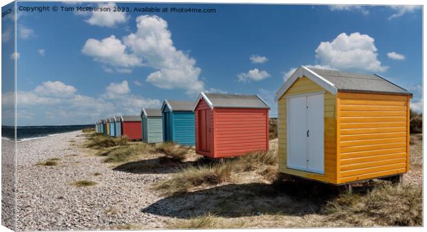 Colourful Serenity: Findhorn's Beach Huts Canvas Print by Tom McPherson
