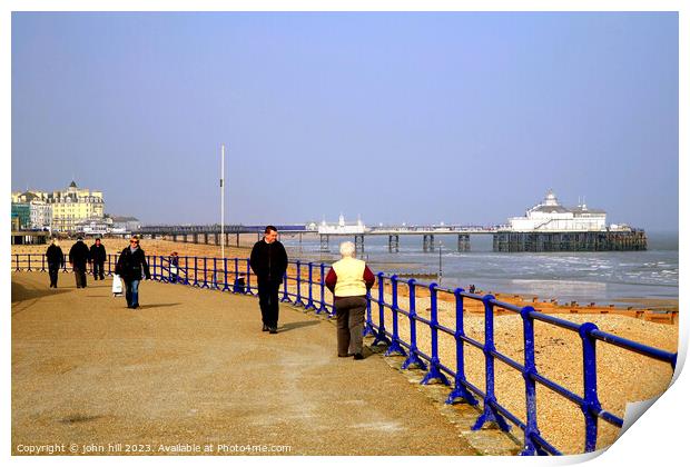 Serene Stroll along Eastbourne's Iconic Coastline Print by john hill