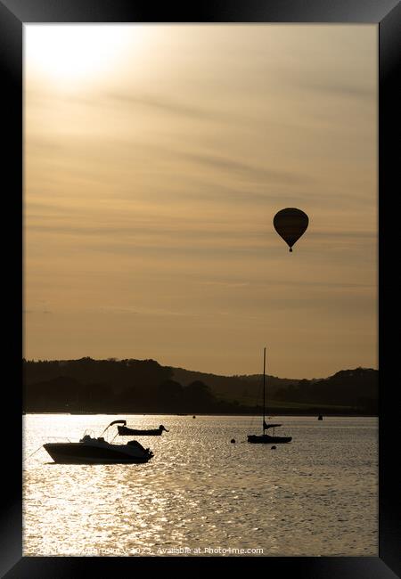 A hot air balloon flying over the River Exe as see Framed Print by Ambrosini V