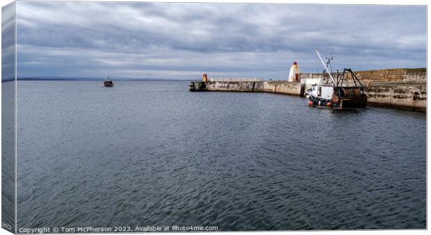 Departure from Bustling Burghead Harbour Canvas Print by Tom McPherson