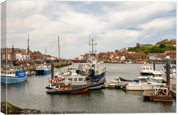 Boats moored up in Whitby marina Canvas Print by Chris Yaxley