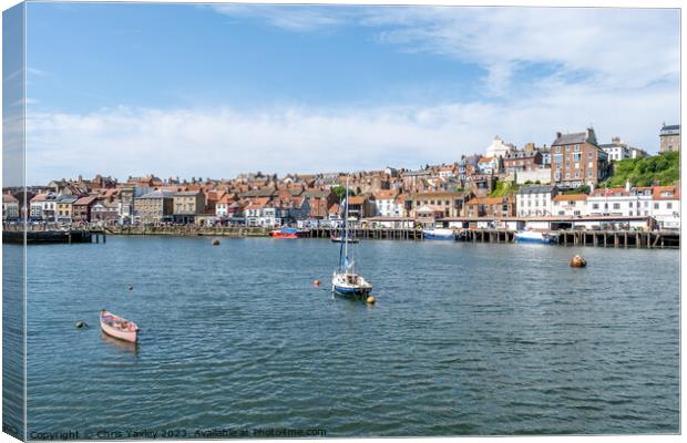 View across the River Esk and Whitby harbour on the North Yorkshire coast Canvas Print by Chris Yaxley