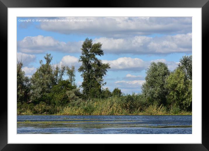 Cumulus clouds over the forest on Dnipro river Framed Mounted Print by Stan Lihai