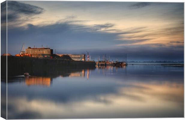 Early morning colours and reflections over the Brightlingsea Creek  Canvas Print by Tony lopez