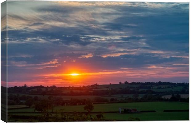 Sunset over Staverton Fields Canvas Print by Helkoryo Photography
