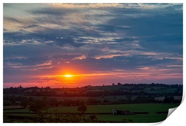 Sunset over Staverton Fields Print by Helkoryo Photography
