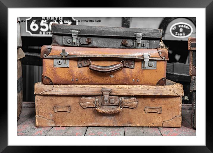 Vintage Suitcases Stacked High Framed Mounted Print by John Hastings