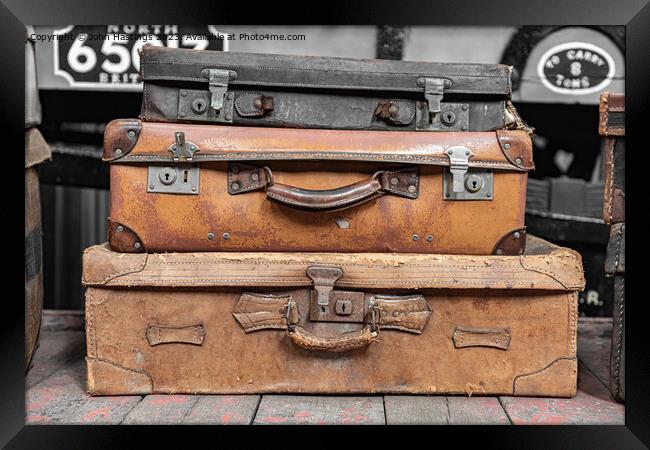 Vintage Suitcases Stacked High Framed Print by John Hastings
