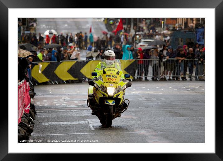 Cycling road race police support Framed Mounted Print by John Rae
