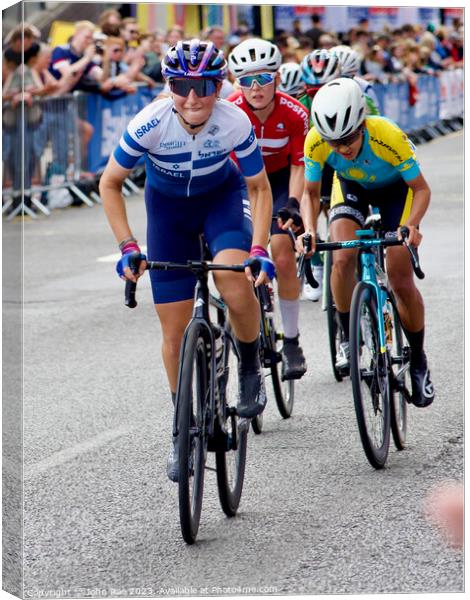 Women's elite riders cycling road race Canvas Print by John Rae