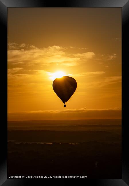 Sunrise over Hot Air Balloon Framed Print by David Aspinall