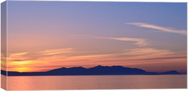 Arran silhouetted at sunset, viewed from Prestwick Canvas Print by Allan Durward Photography