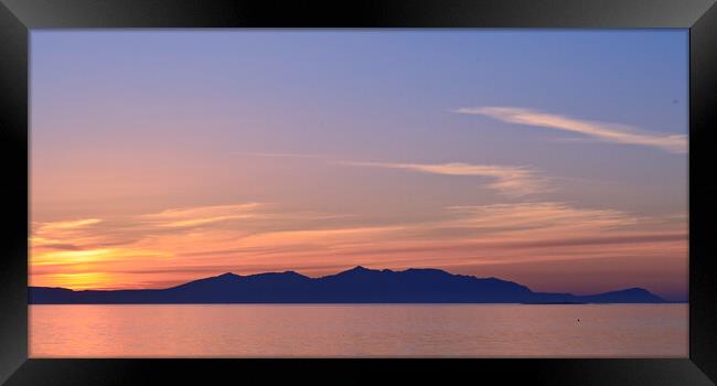 Arran silhouetted at sunset, viewed from Prestwick Framed Print by Allan Durward Photography