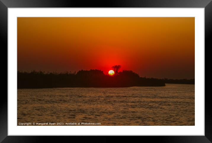 Okavango river sunset Framed Mounted Print by Margaret Ryan