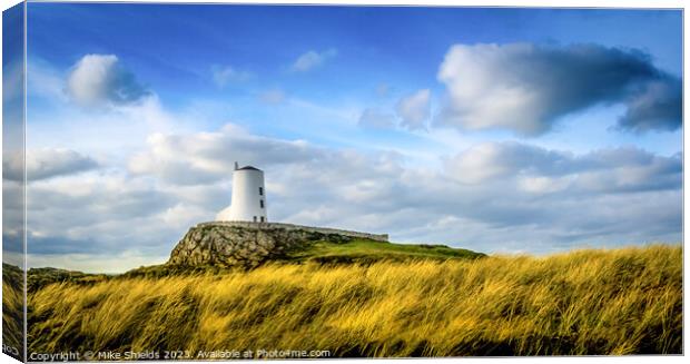Twr Mawr Lighthouse: A Coastal Beacon Canvas Print by Mike Shields