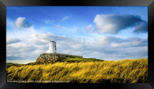 Twr Mawr Lighthouse: A Coastal Beacon Framed Print by Mike Shields