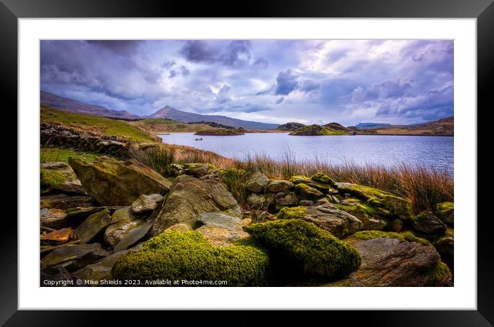 Rocks around a Lake Framed Mounted Print by Mike Shields